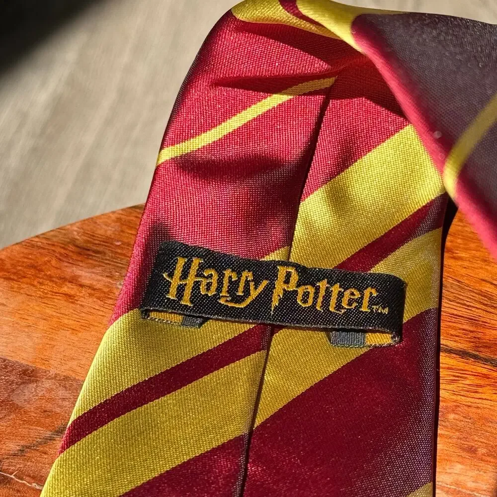 Harry Potter Gryffindor Necktie Burgundy Gold Striped House Crest Warner Bros
